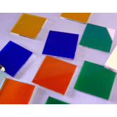 Square colored spectrally filtered lens